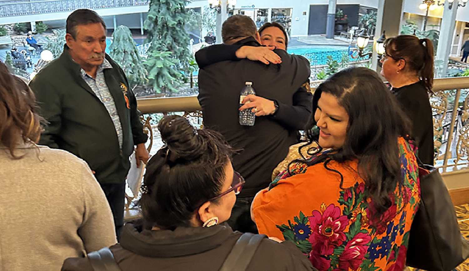 Members of the James Smith Cree Nation embrace Cst. Heidi Marshall after the second day of a coroners inquest in Saskatoon.